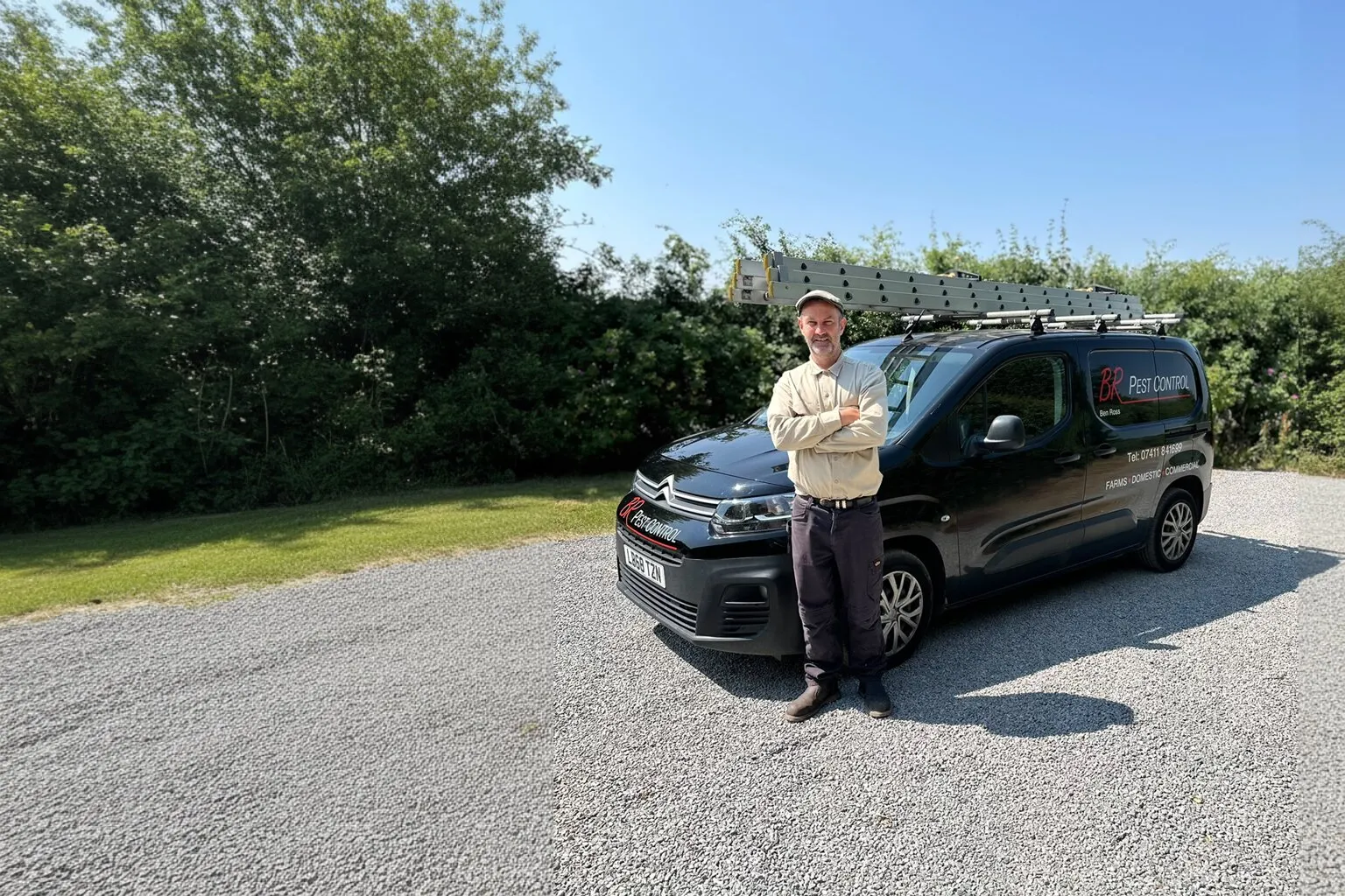 Ben Ross of BR Pest Control standing in front of the company van in North Yorkshire